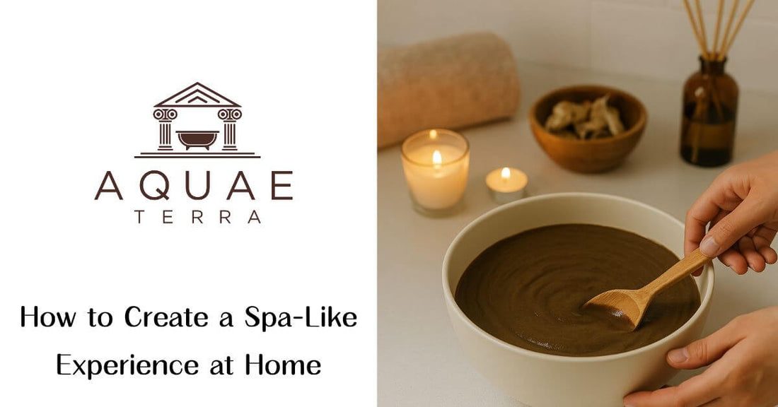 Home spa setup with candles, essential oils, and luxury towels on marble surface